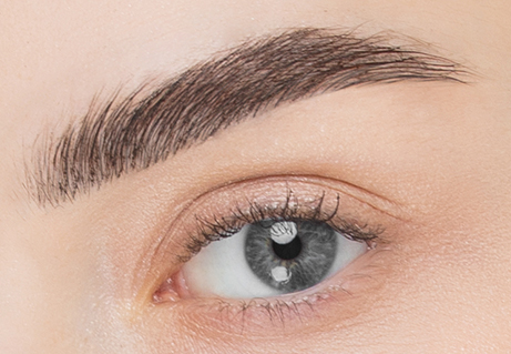 Close-up of an eye with long lashes