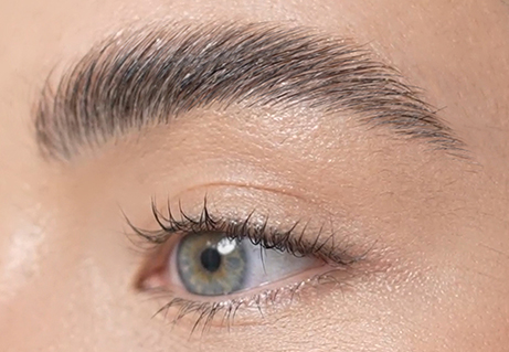 Close-up of an eye with long lashes