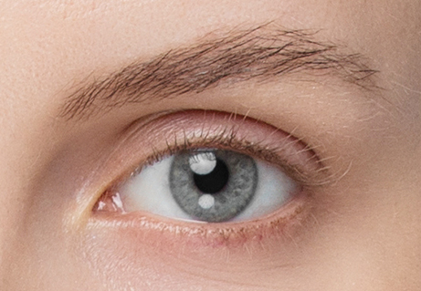 Close-up of an eye with long lashes