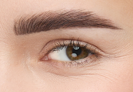 Close-up of an eye with long lashes