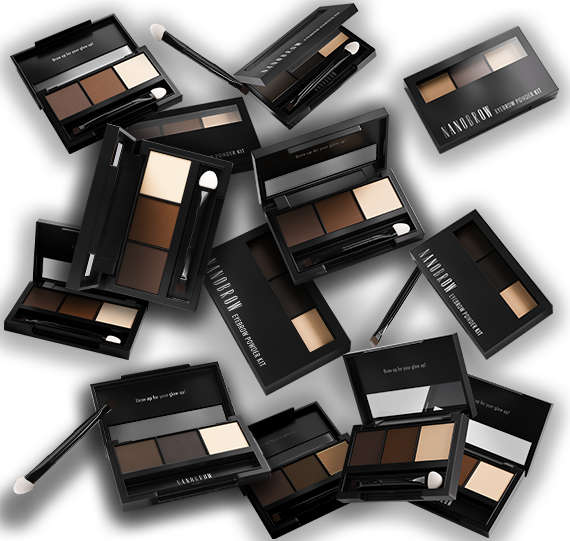 Eyebrow powder palettes with applicators on dark background