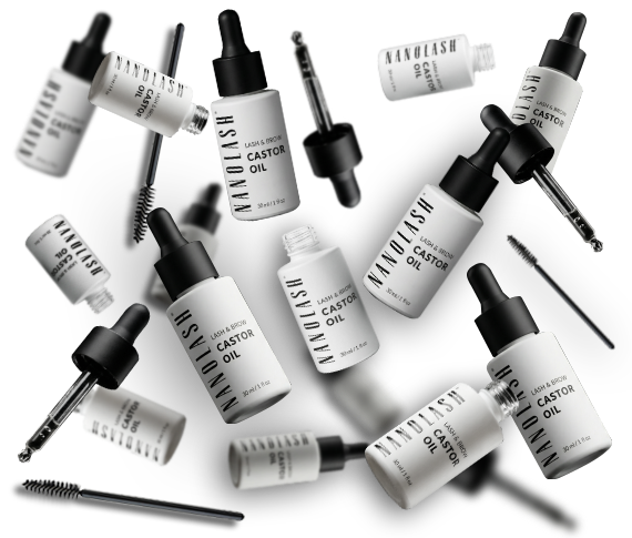 Multiple bottles of Nanolash castor oil arranged on a black background