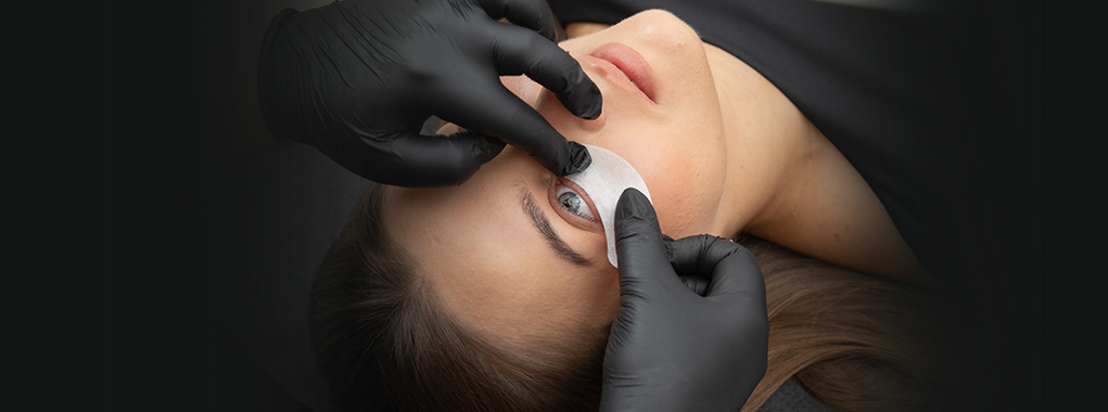 Hydrogel eye patch applied under eye during lash treatment