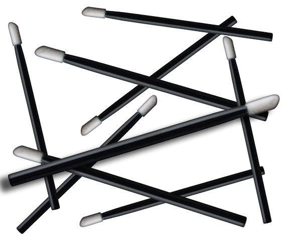 Black lint-free applicators with white tips on dark background