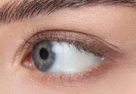 Close-up of an eye with short eyelashes