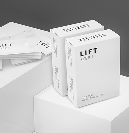 Nanolash Lash Lift activators standing on white boxes