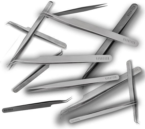 Metal eyelash tweezers arranged on dark background